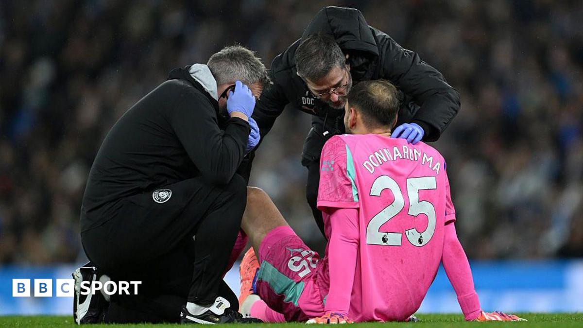 Gianluigi Donnarumma of Manchester City receives medical treatment during the Premier League match against Leeds United